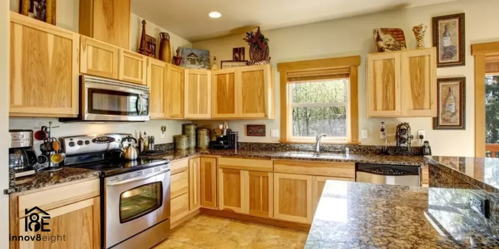 How to Pick Kitchen Wall Colors with Natural Hickory Cabinets and Black Countertops